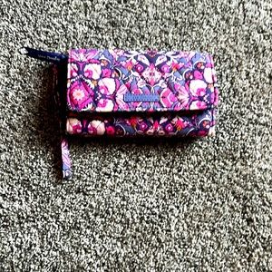 Vera Bradley, pink and purple wristlet, holds cash, cards, phone, and change